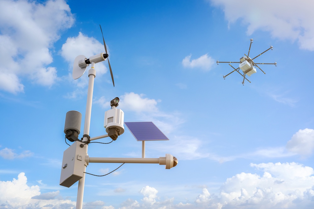 farmland weather station with drone flying above